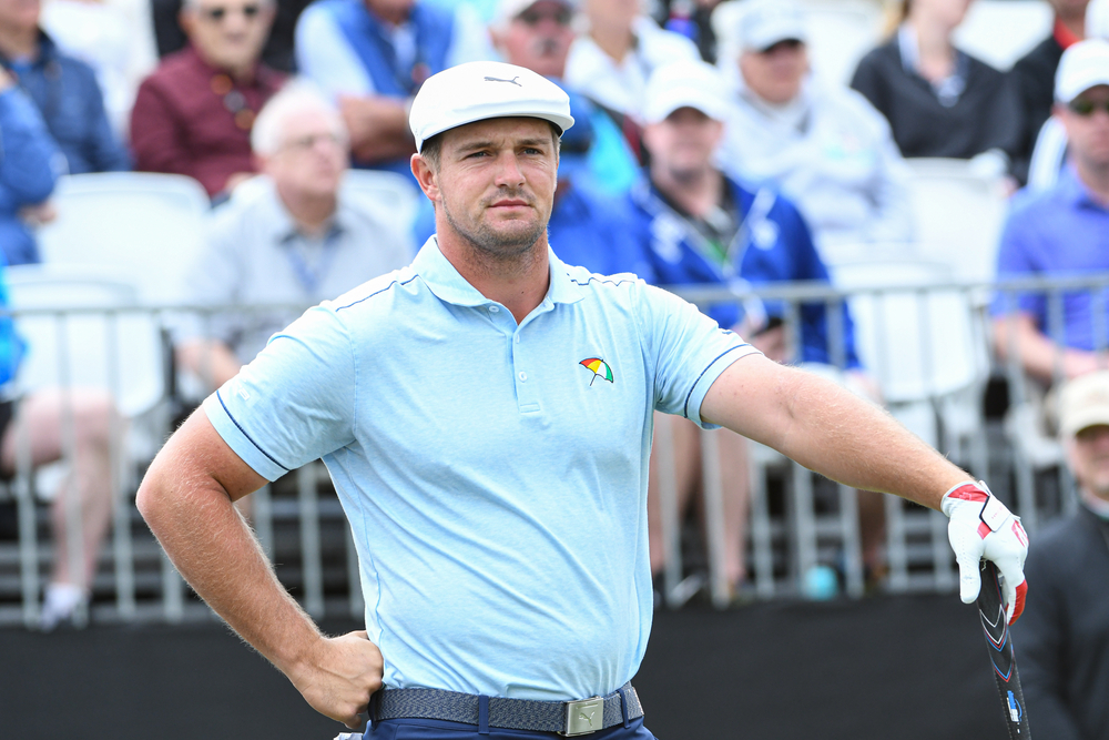 photograph of Bryson DeChambeau at event with crowd in background