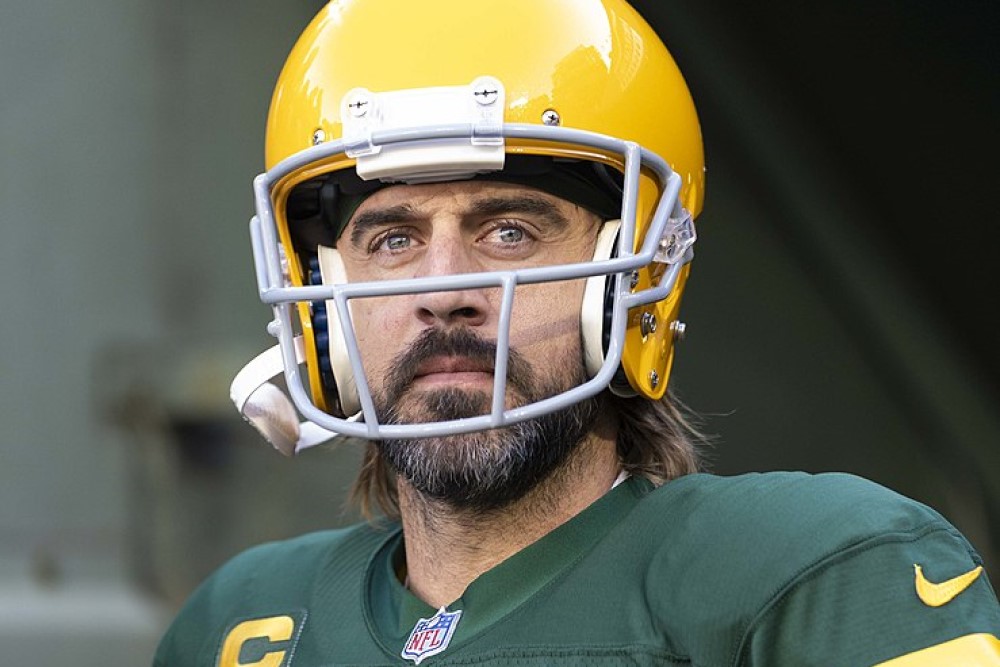 photograph of Aaron Rogers in football uniform with helmet