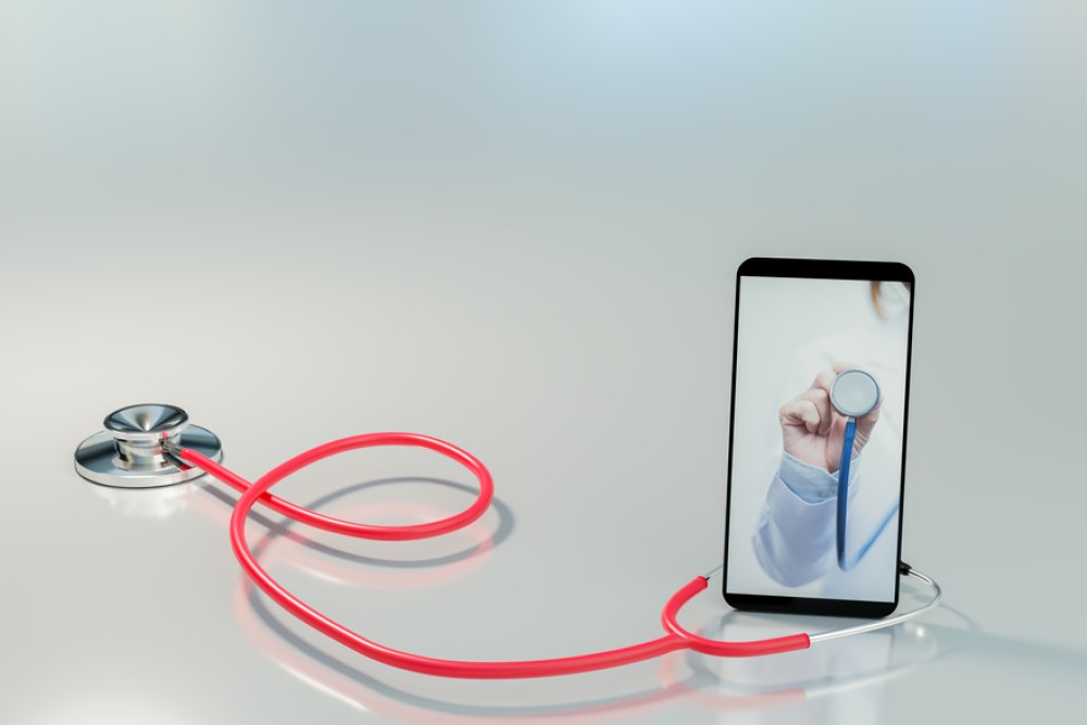 photograph of stethoscope wrapped around phone