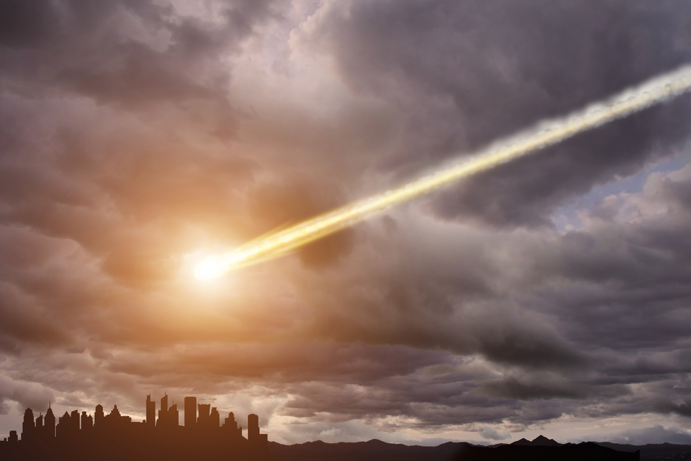 image of meteor headed toward city skyline