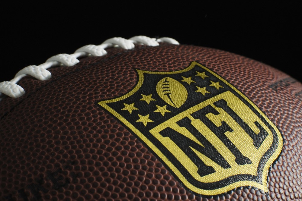 photograph of NFL emblem on football