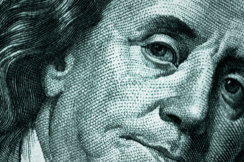 close-up image of Benjamin Franklin on a hundred dollar bill