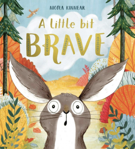 Cover illustration for A Little Bit Brave by Nicola Kinnear featuring a watercolor painting of a brown bunny with big, frightened eyes in the foreground and a forest scene in the background