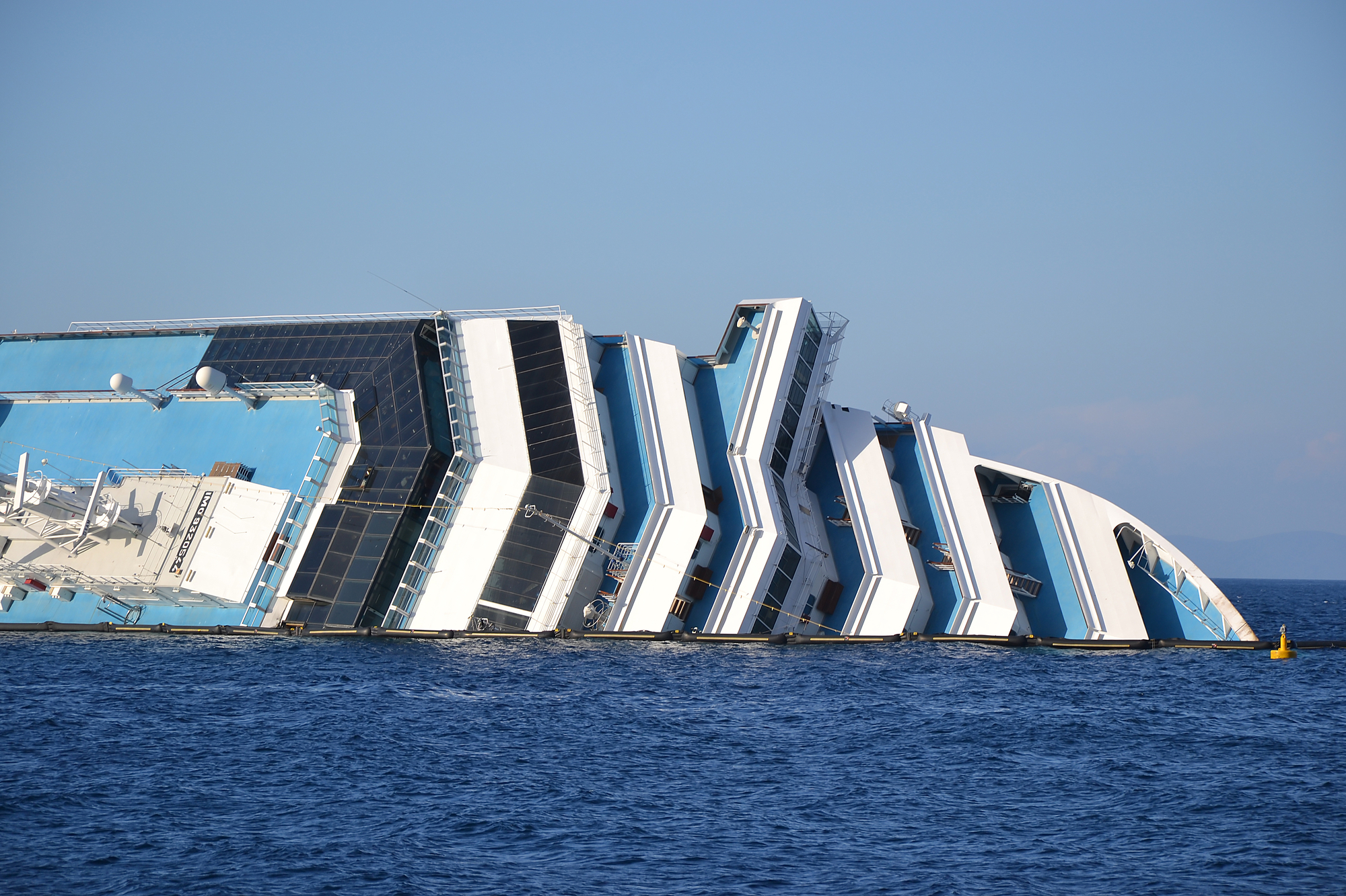 photograph of cruise ship sinking