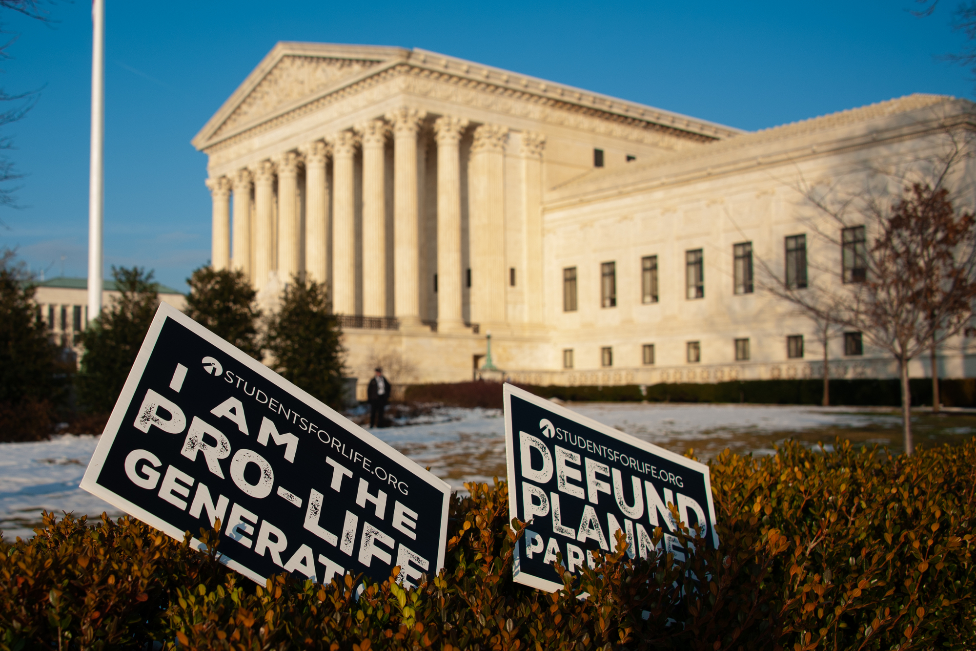 photograph of abandoned pro-life signs in front of Supreme Court Building