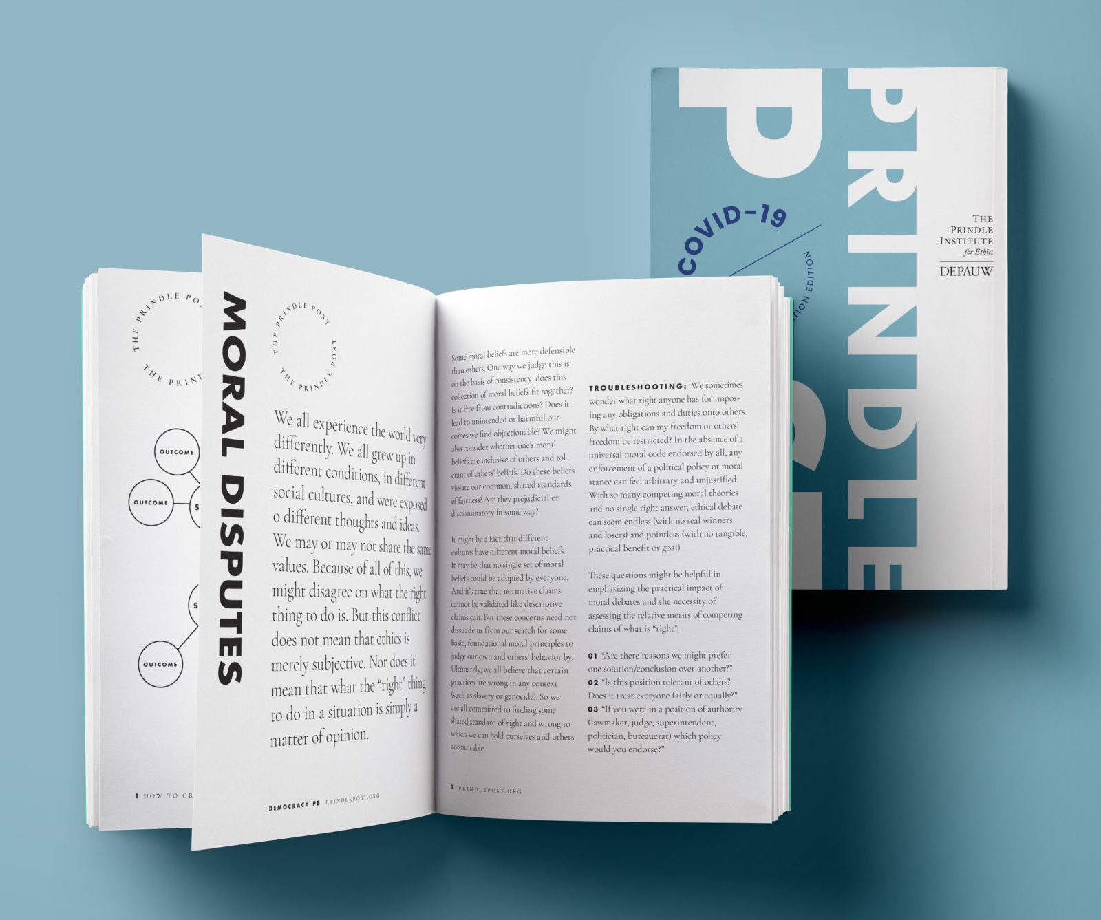 A color photograph of two Prindle Post workbooks on the theme of COVID-19. One of the books is closed and features a light blue cover. The other is open to a page about moral disputes.