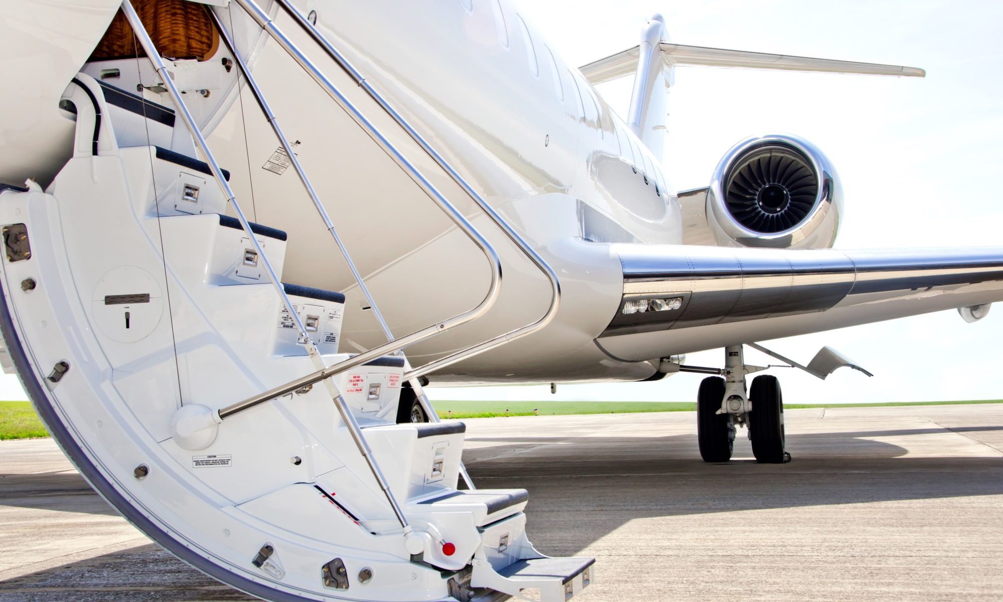 photograph of stairway to private jet