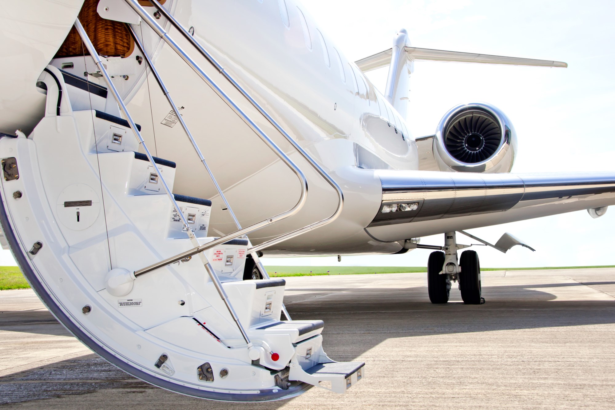 photograph of stairway to private jet