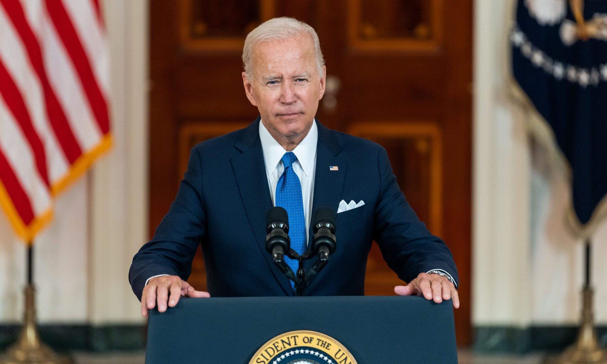 photograph of President Biden at podium