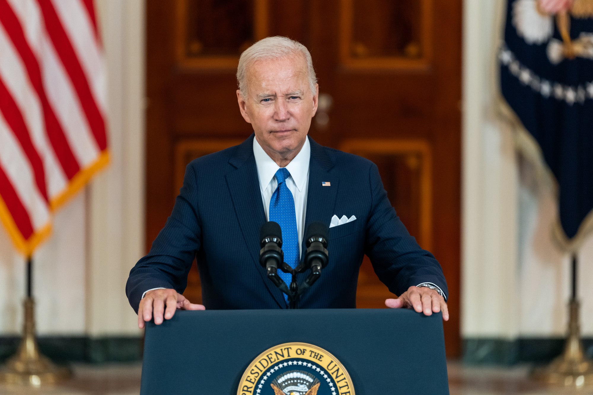 photograph of President Biden at podium