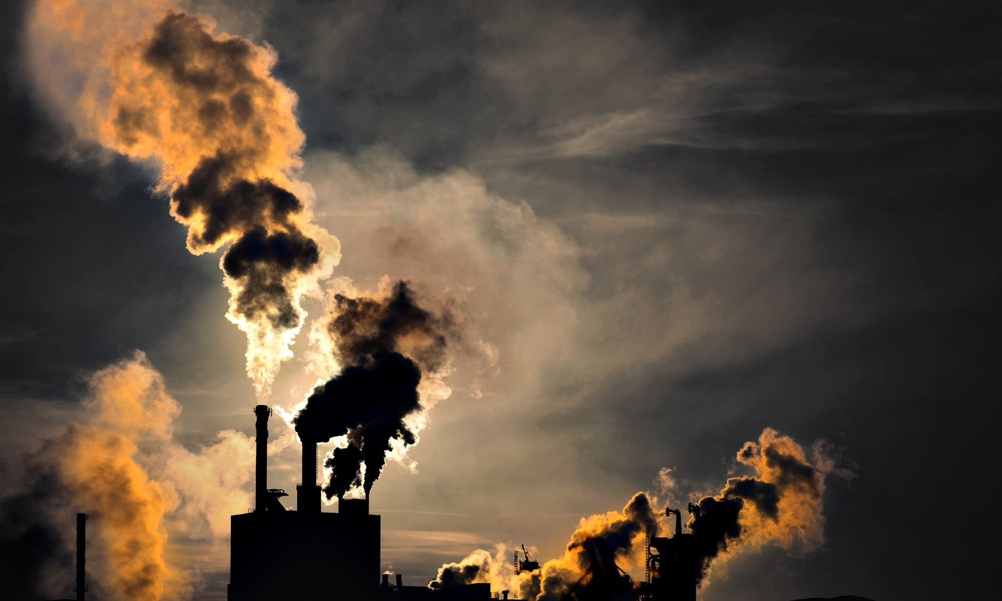 photograph of factory air pollution silhouette