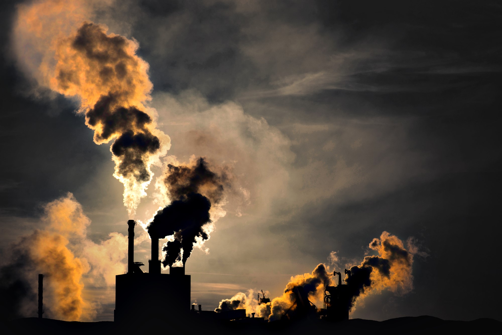 photograph of factory air pollution silhouette