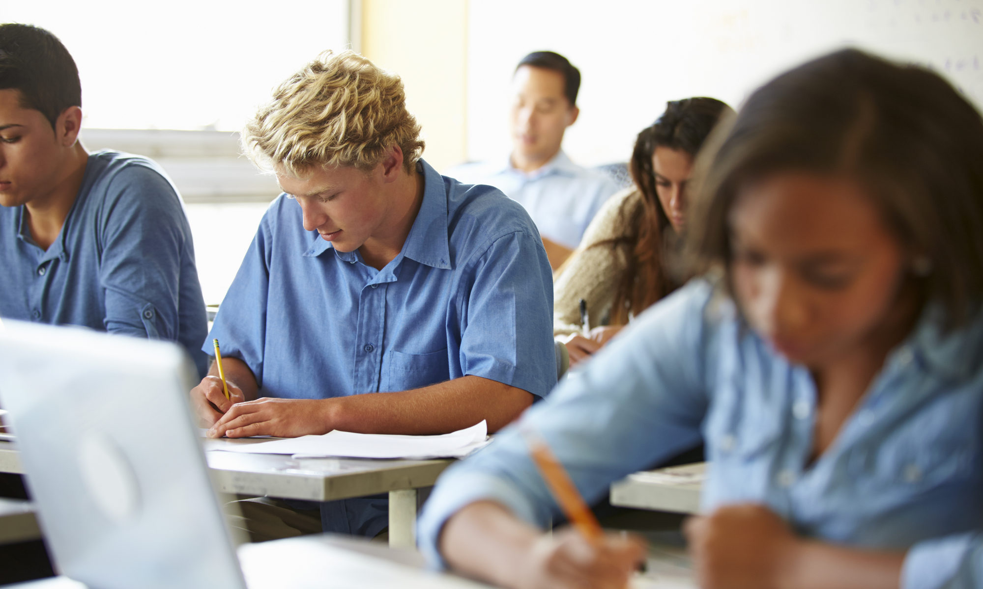 photograph of high school students taking exam