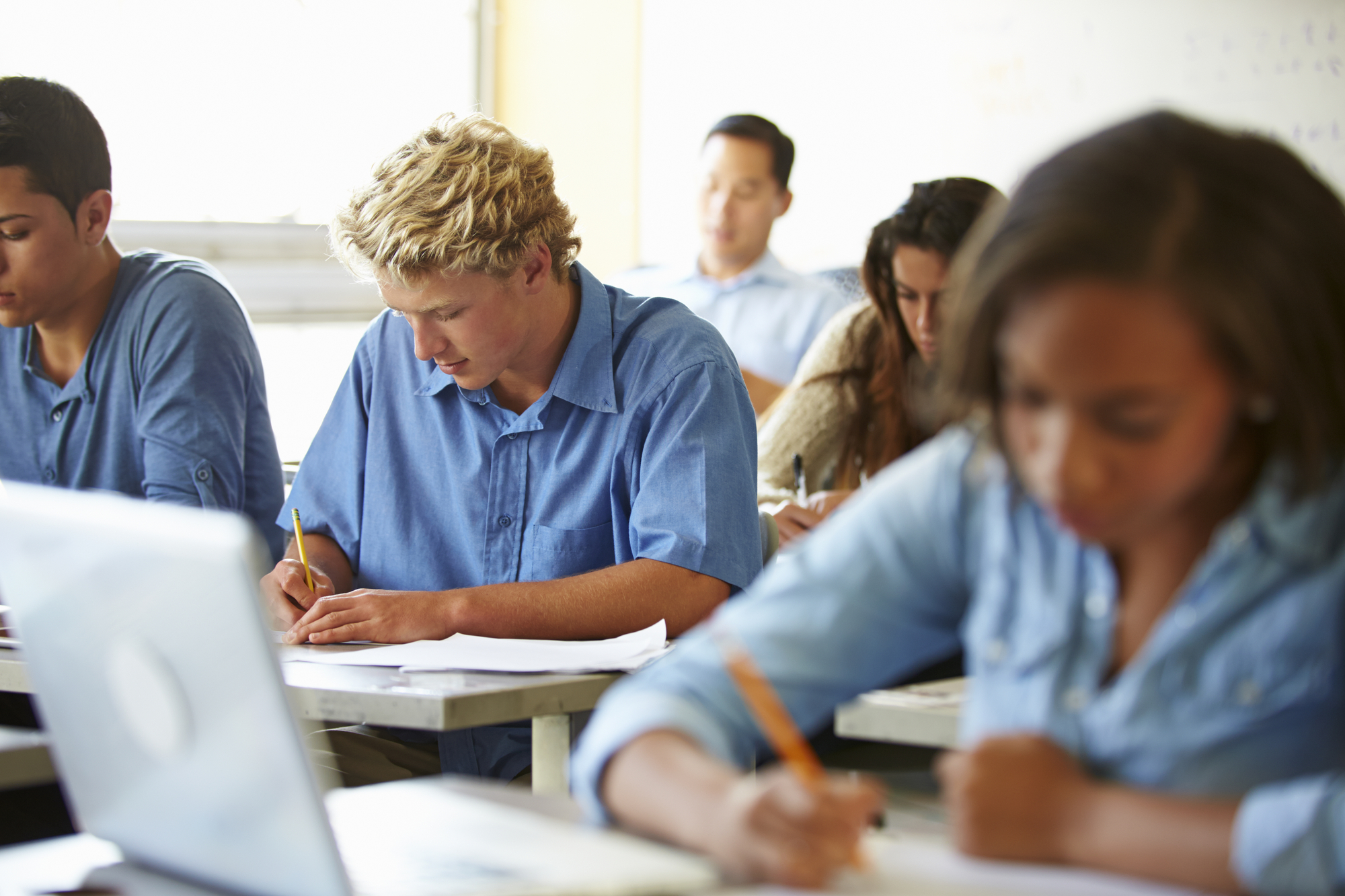 photograph of high school students taking exam