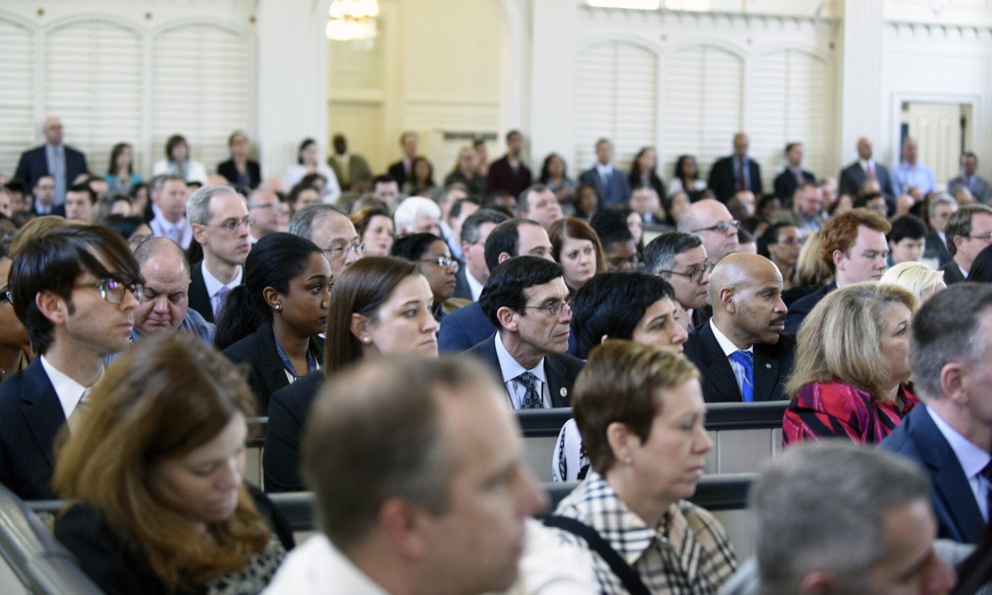 photograph of crowd at town hall