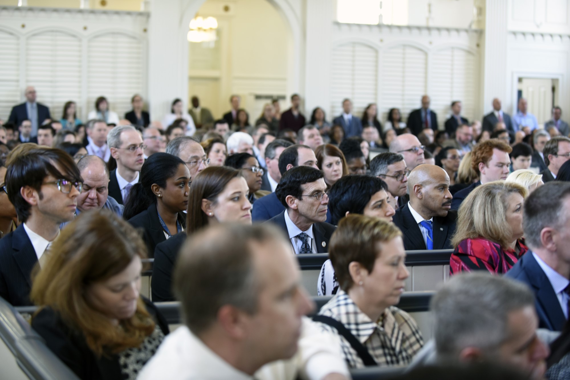 photograph of crowd at town hall