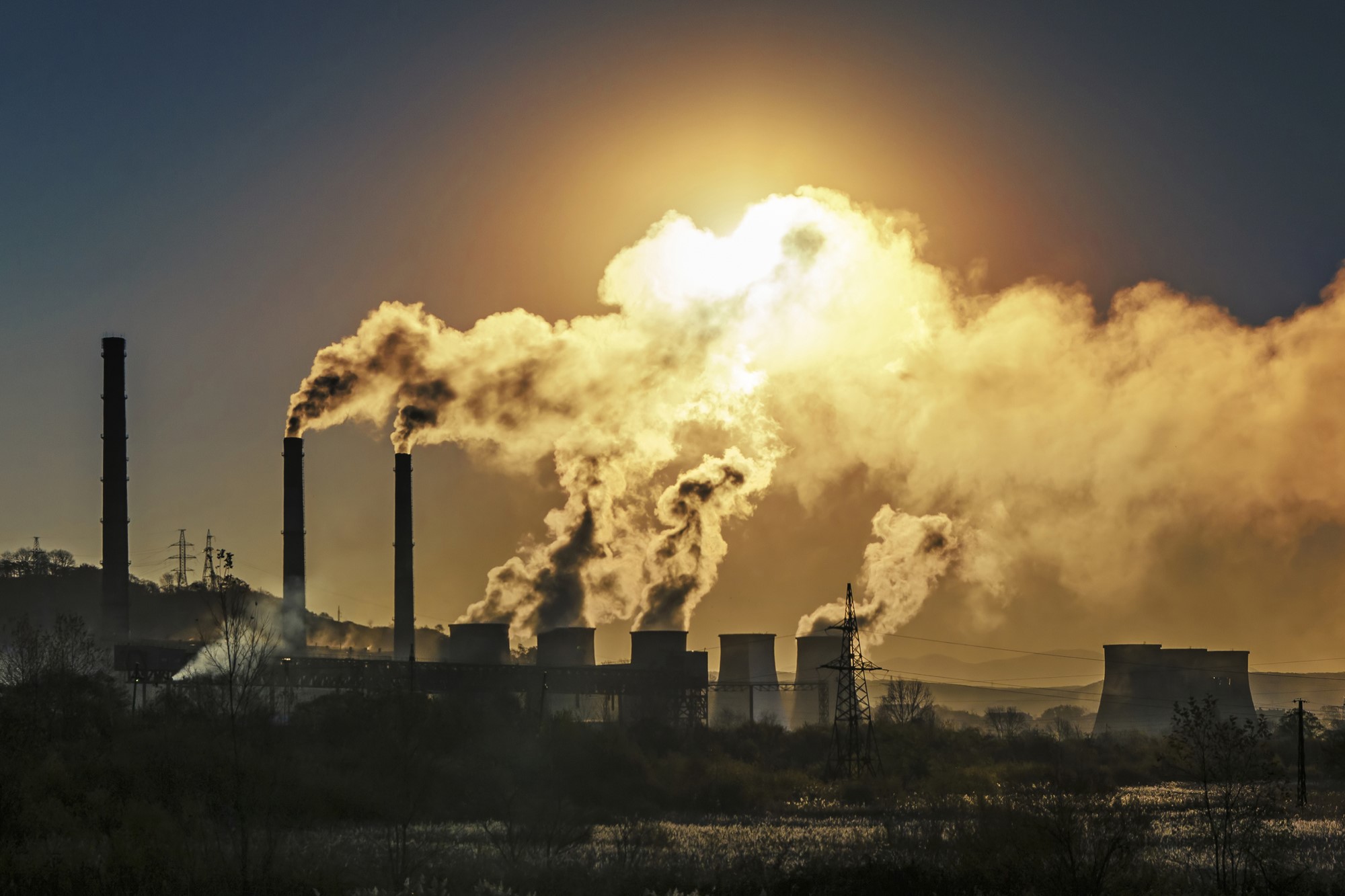 photograph of plant pollution blotting out sun