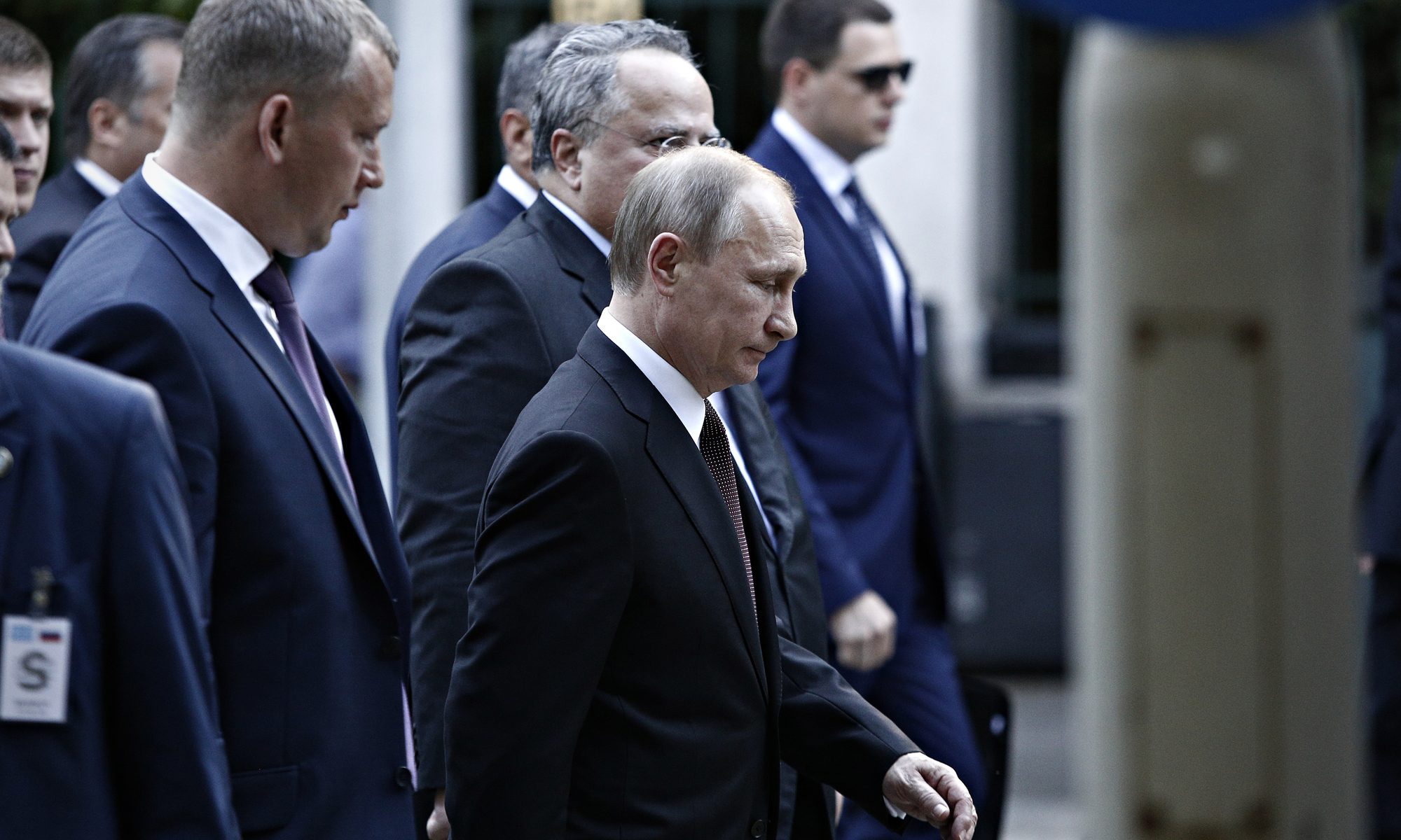 photograph of Putin walking with security detail