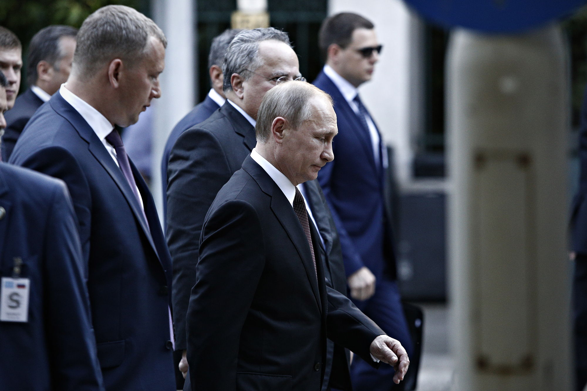photograph of Putin walking with security detail