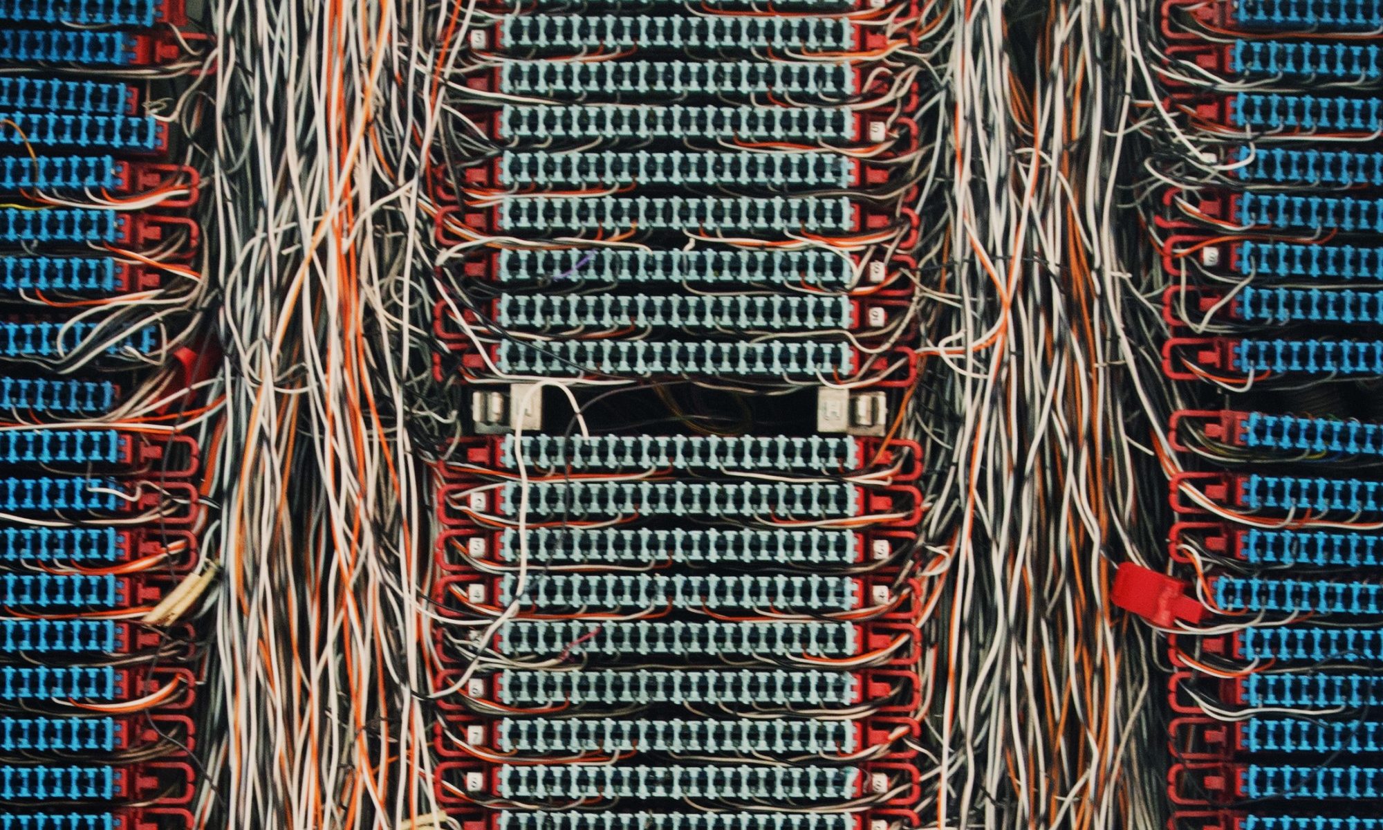 photograph of cluttered telephone switchboard