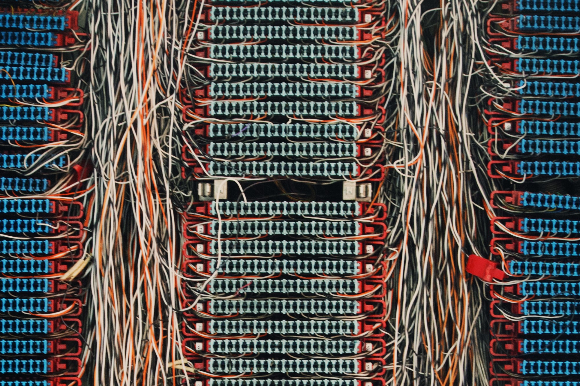 photograph of cluttered telephone switchboard