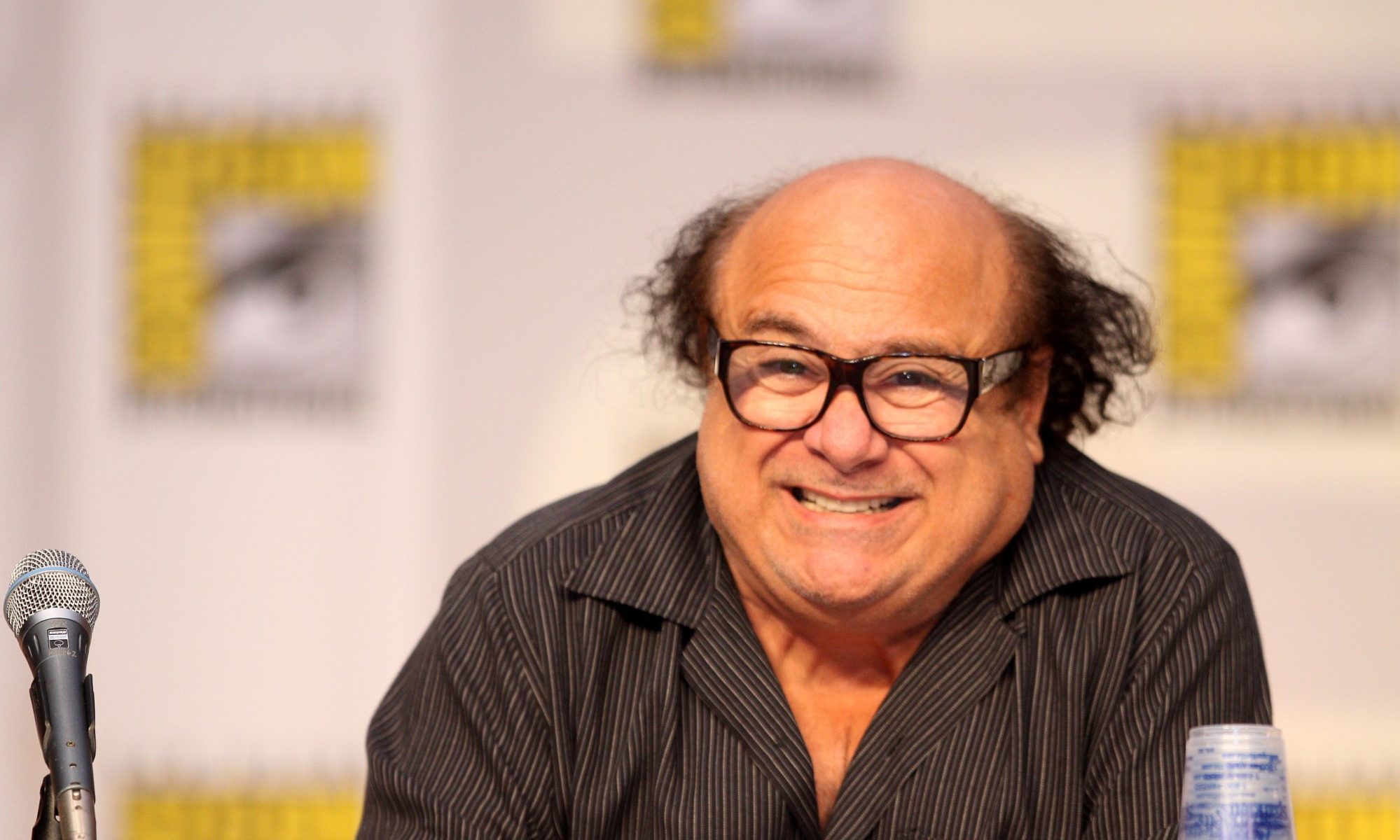 photograph of Danny DeVito at ComicCon panel for IASIP