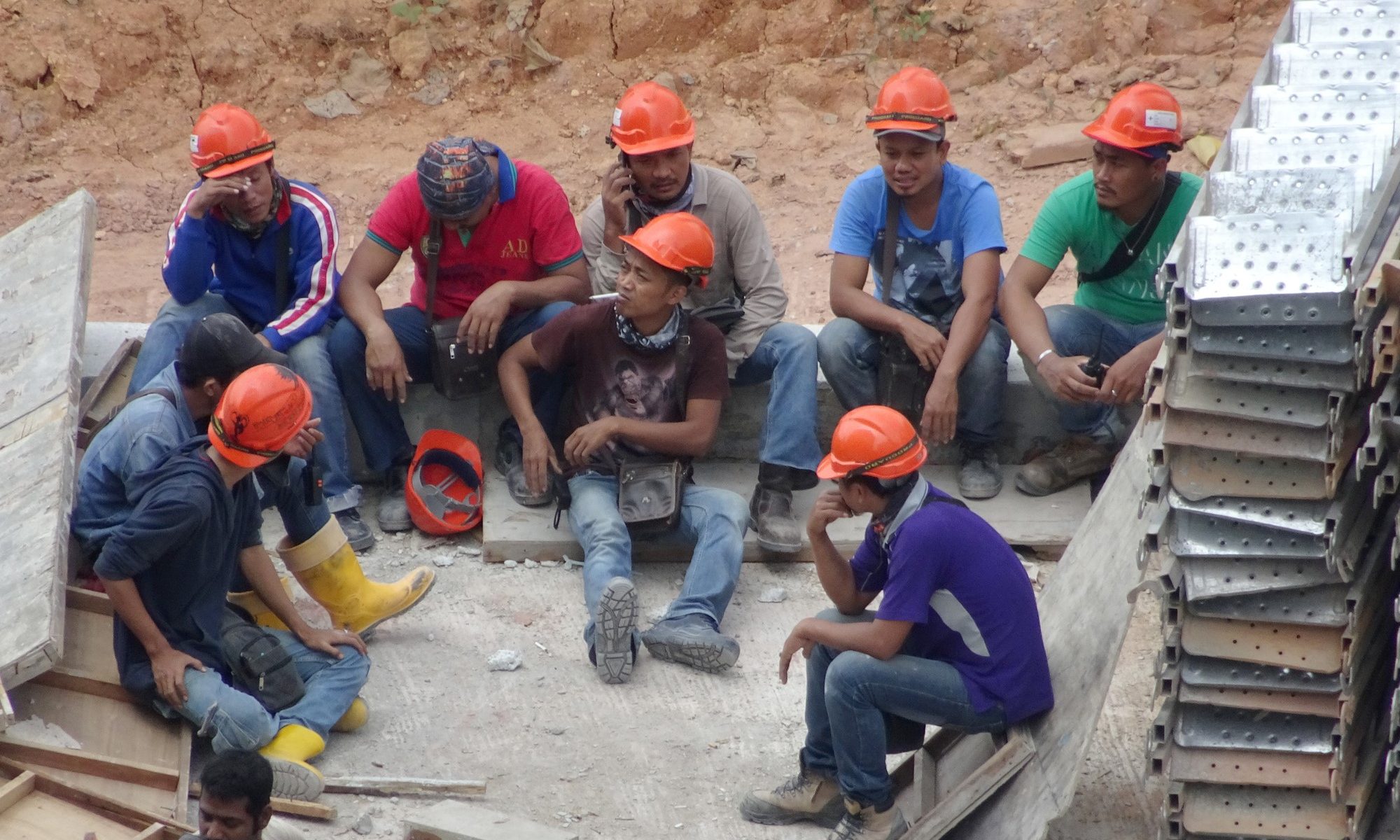 photograph of construction workers on break at job site