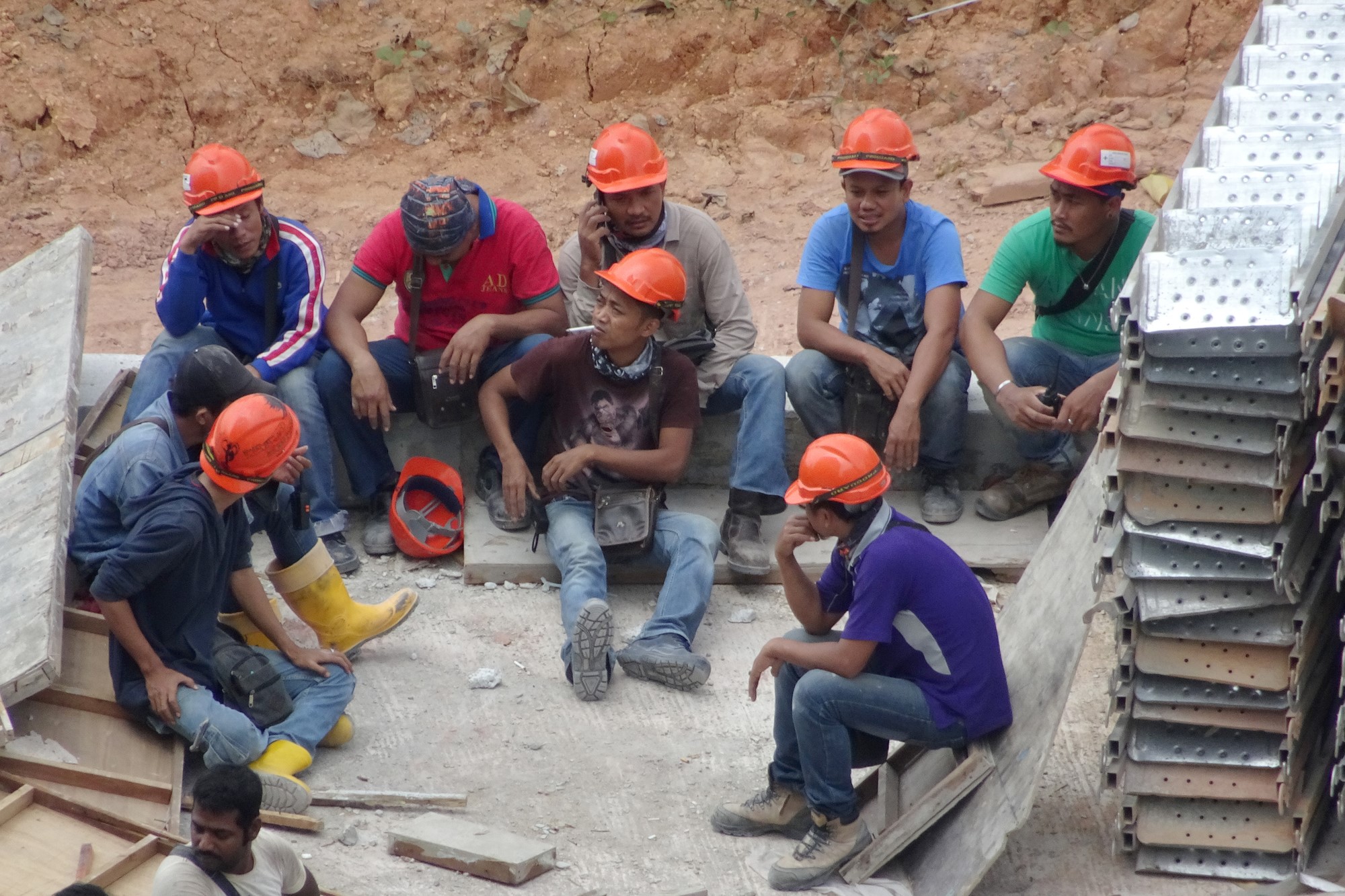 photograph of construction workers on break at job site