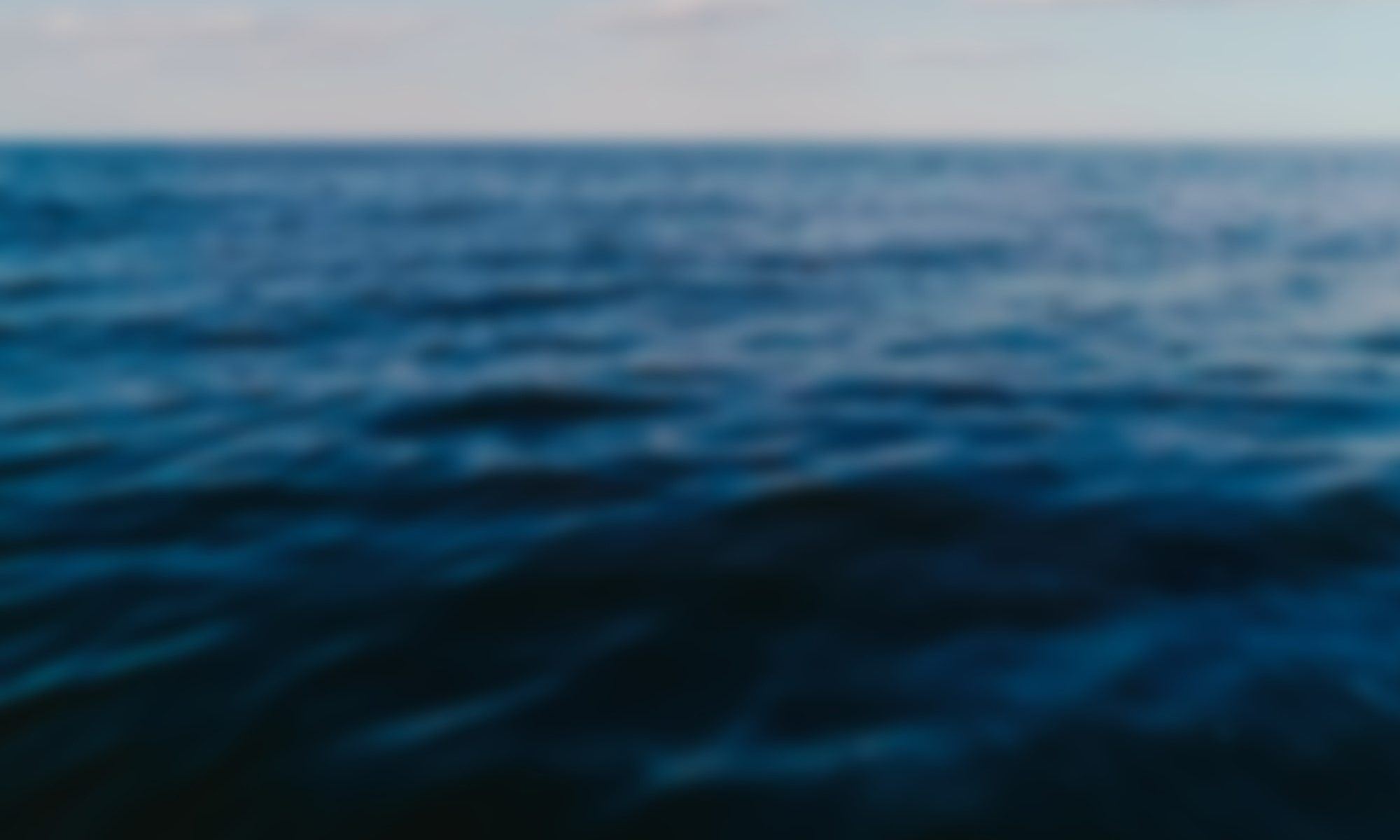 blurred photograph of the ocean