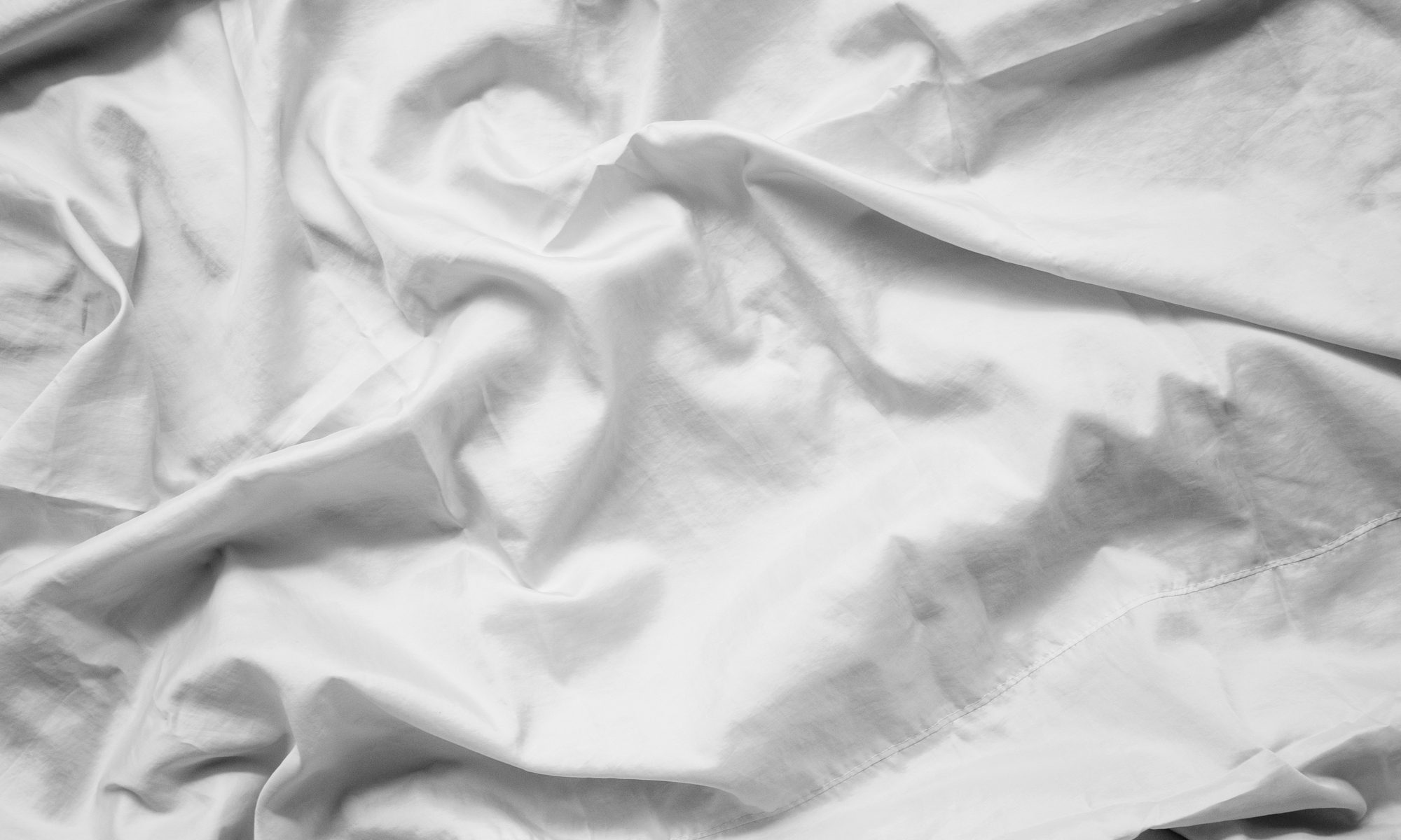 photograph of wrinkled sheets