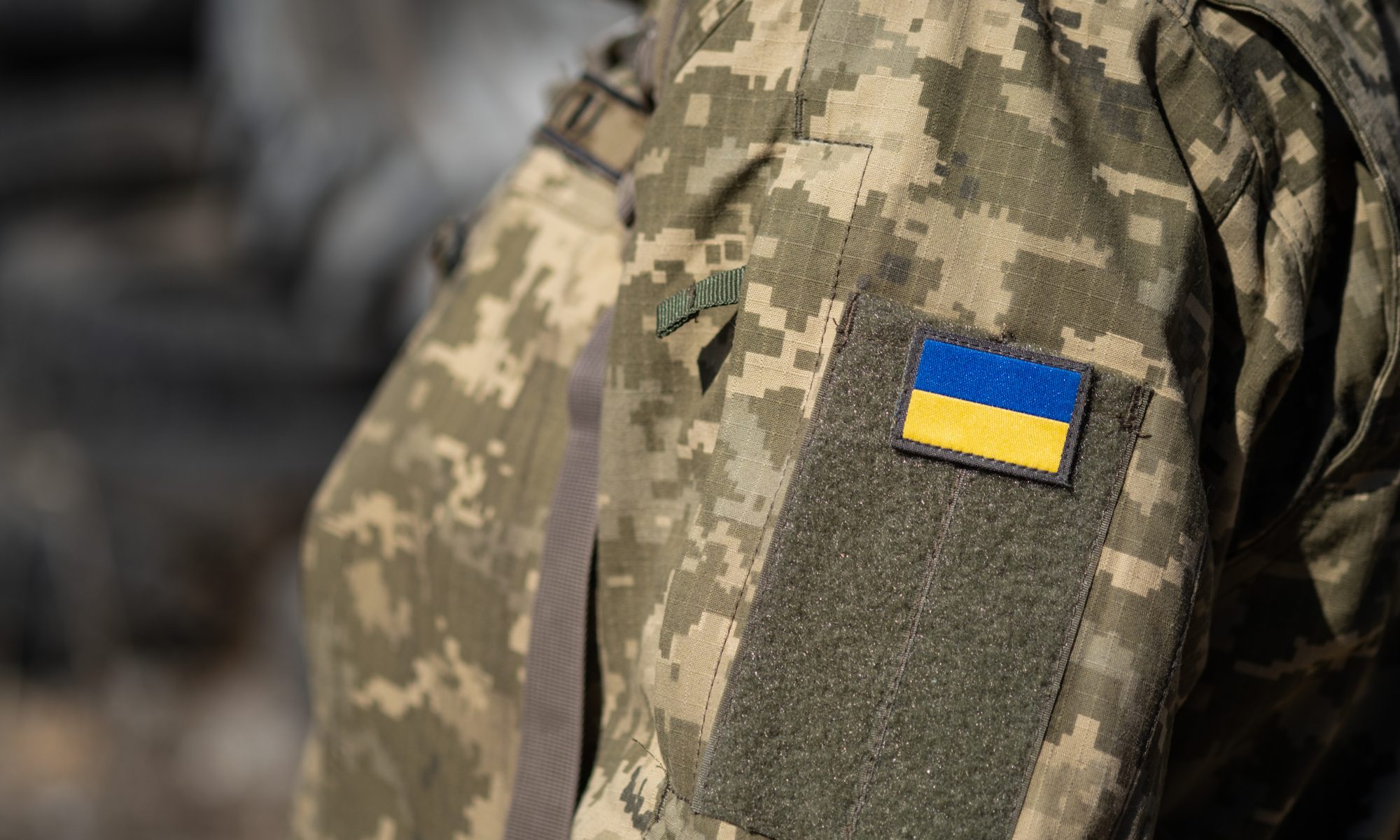 photograph of Ukrainian flag on military uniform