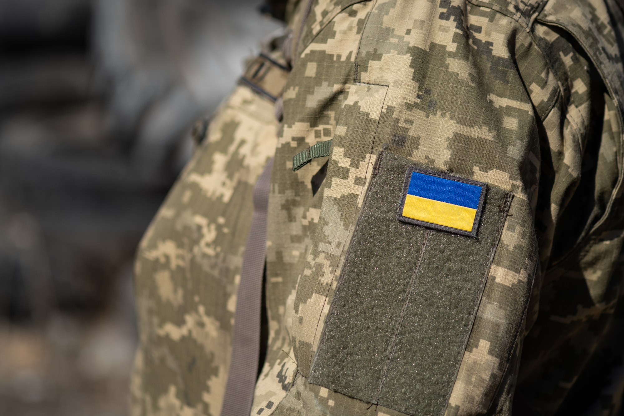 photograph of Ukrainian flag on military uniform