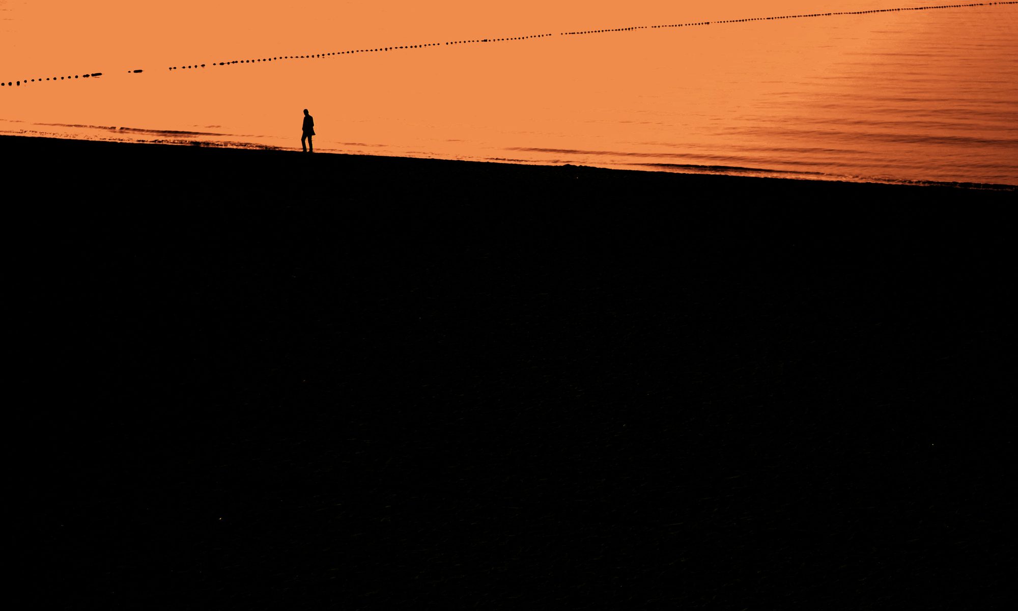 image of silhouette walking long incline of empty space