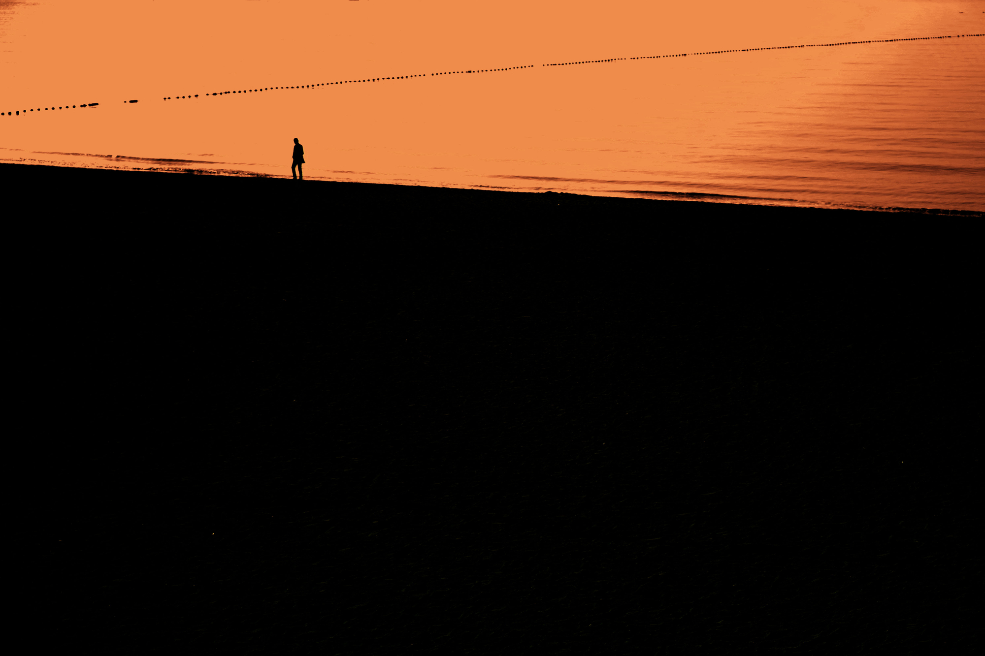 image of silhouette walking long incline of empty space