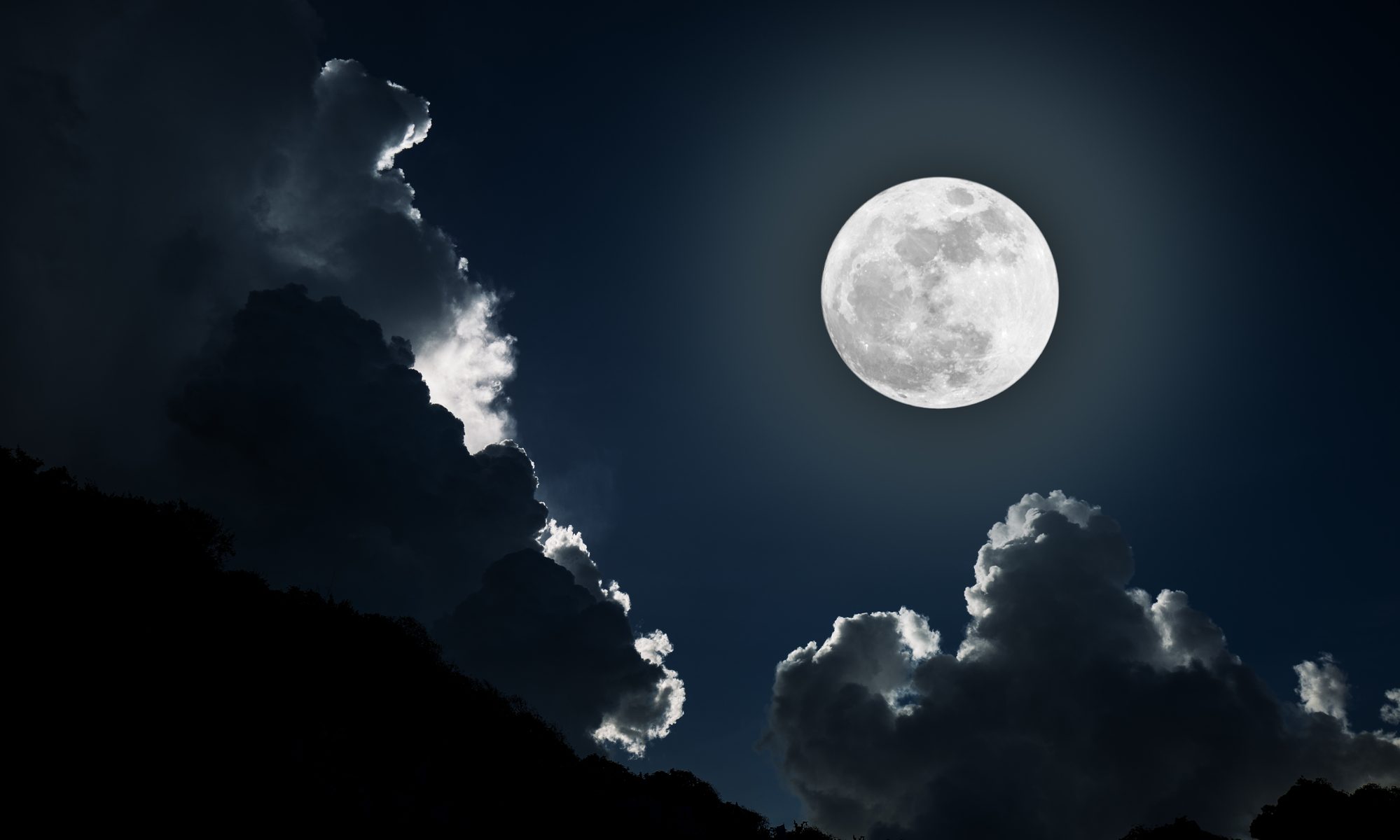 image of full moon with clouds