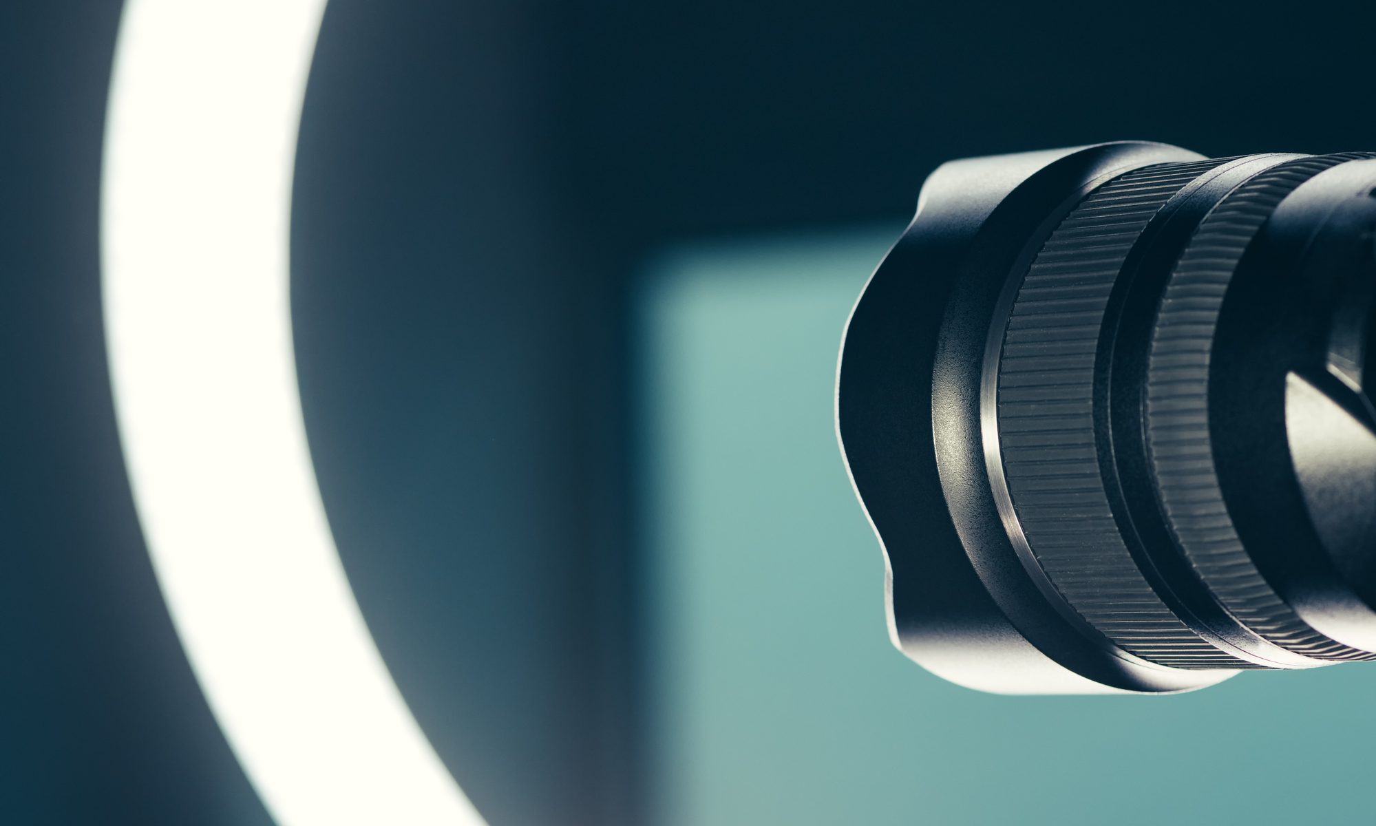 image of camera lens and ring light in studio