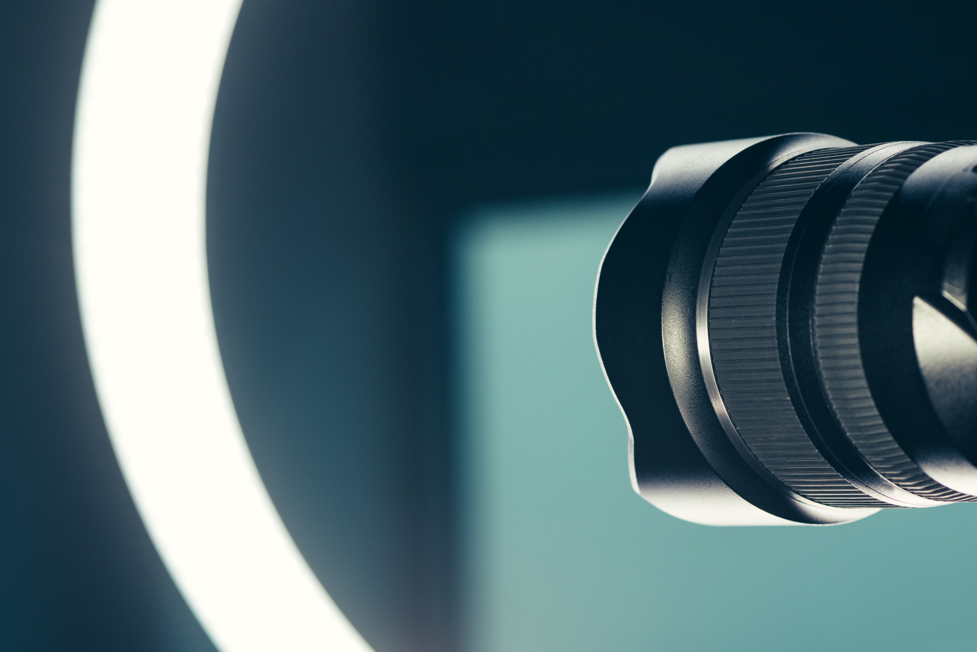 image of camera lens and ring light in studio