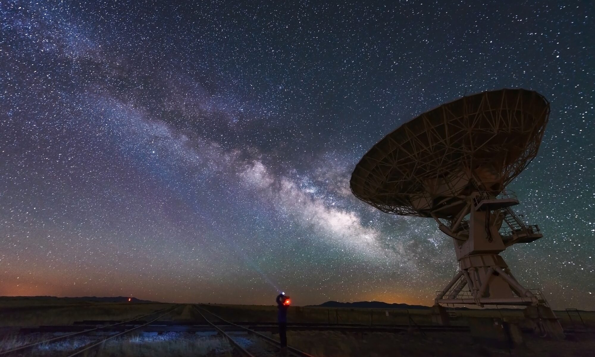 photograph of dish antenna pointed to stars