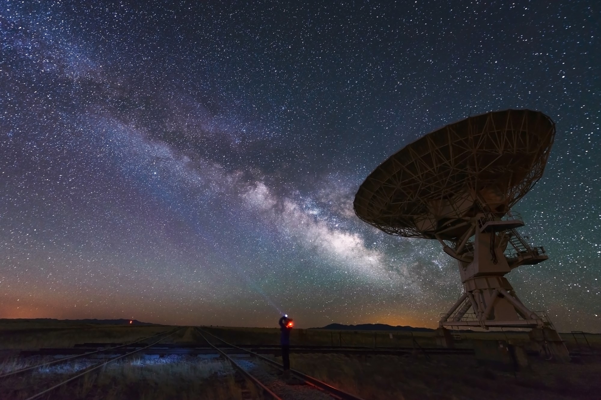 photograph of dish antenna pointed to stars